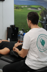 Patient undergoing running gait analysis with a physical therapist at a performance physical therapy clinic in Torrance, CA